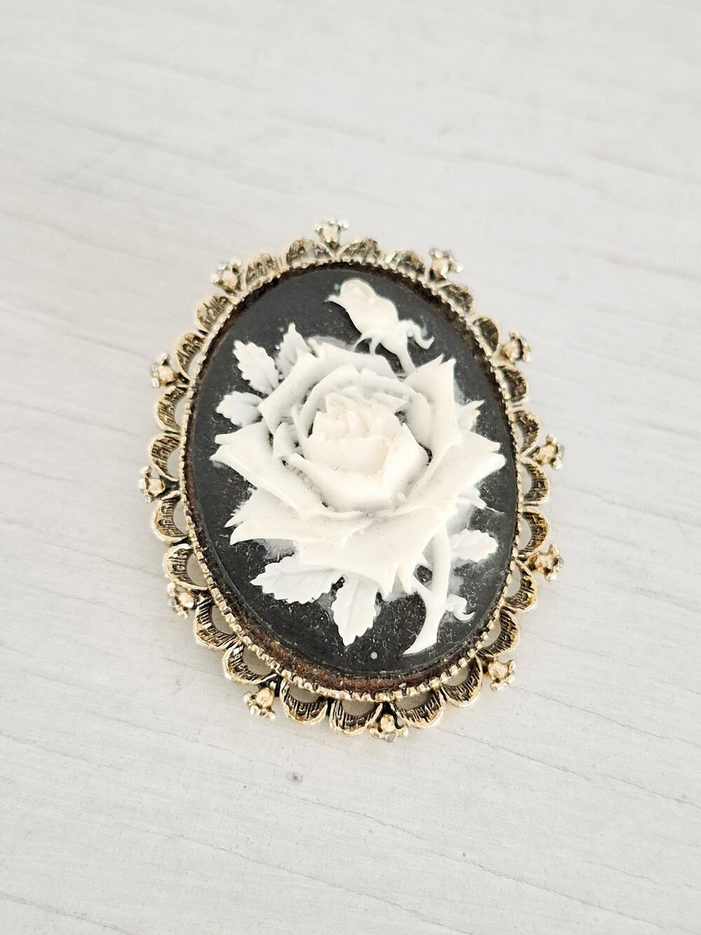 Vintage Gerrys Black and White Floral Resin Cameo Brooch